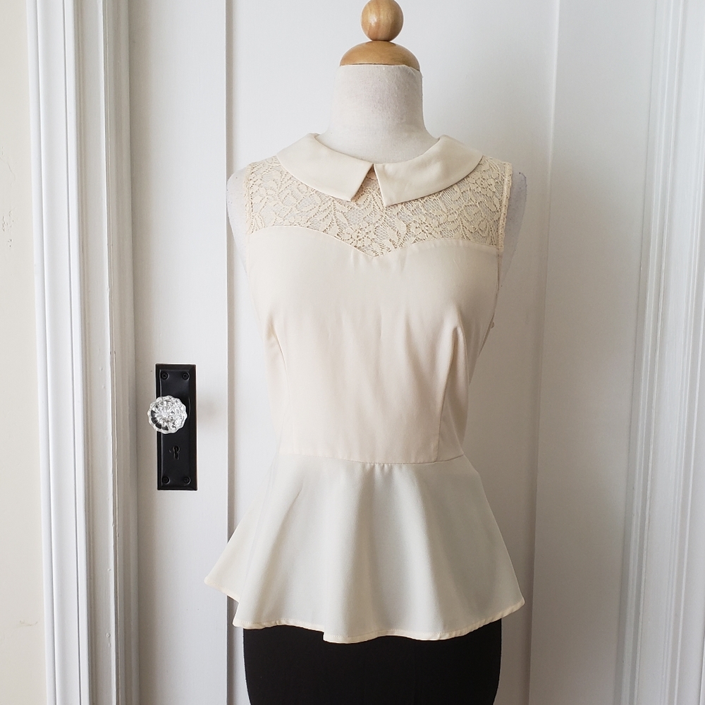 Cream colored peplum top